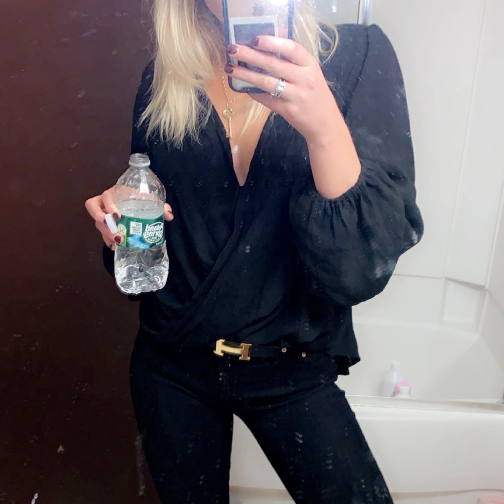 Free people, once worn, black flowy long sleeve top.